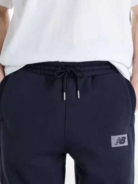 Fleece καπιτονέ παντελόνι New Balance καφέ