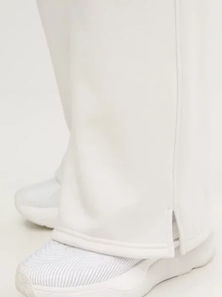 Спортивні штани Under Armour Icon Vida однотонні бежевий