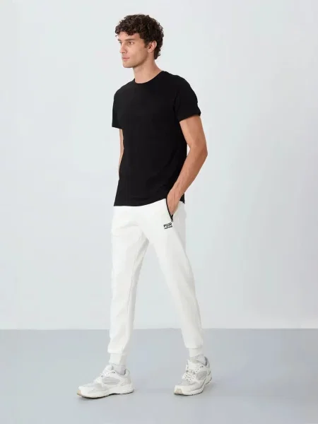 Tommy Life Sportnadrágok Jogginghose okker