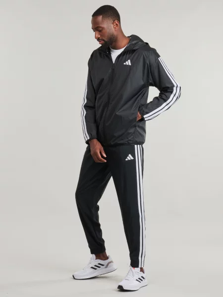 Prugasta vjetrovka Adidas Sportswear crna