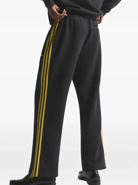 Trčanje hlače Adidas s printom žuta