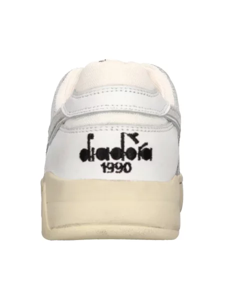 Sneakersy Diadora skórzane z przetarciami białe