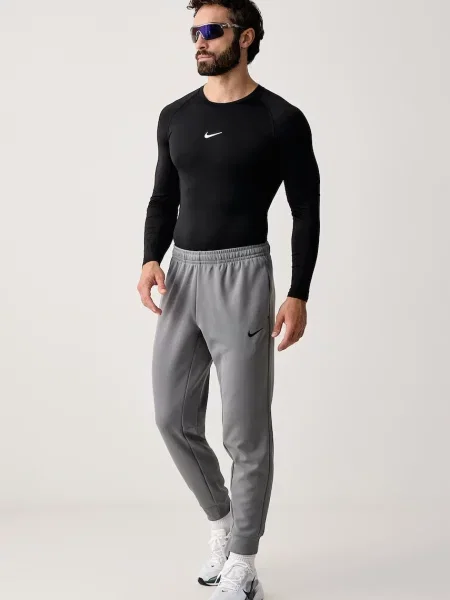Nike spodnie treningowe Hyverse UV Dri-FIT szare
