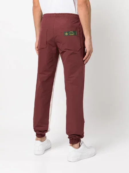 Pantaloni Rhude cu dungi roșu