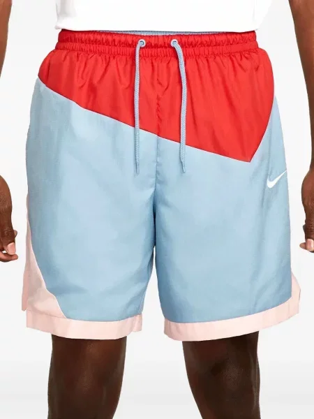 Krátké fleecové kraťasy Nike s potiskem žluté