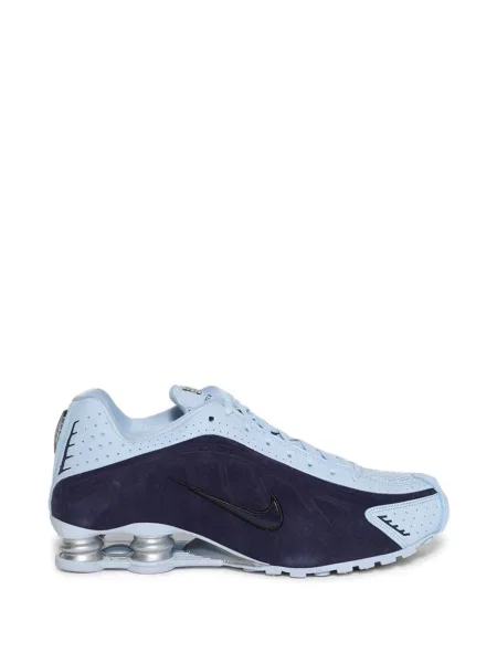 Sneakerși Nike din piele cu perforații maro