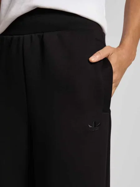 Spodnie dresowe z elastycznym ściągaczem Adidas Originals czarny
