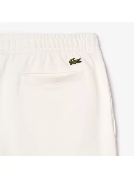 Зауженные спортивные штаны Lacoste голубые