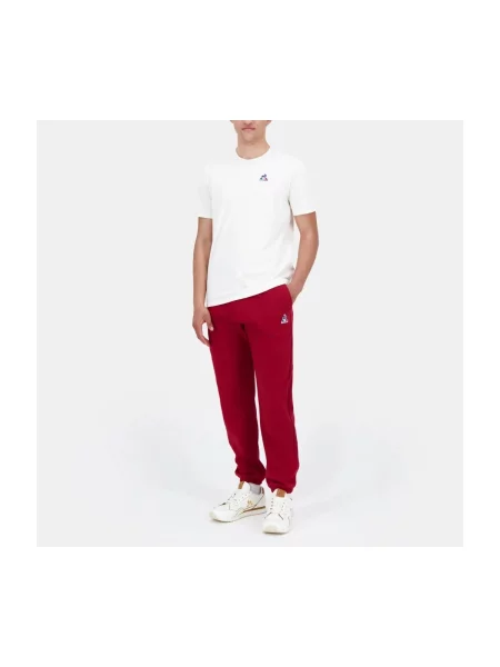 Pantaloni Le Coq Sportif roșu