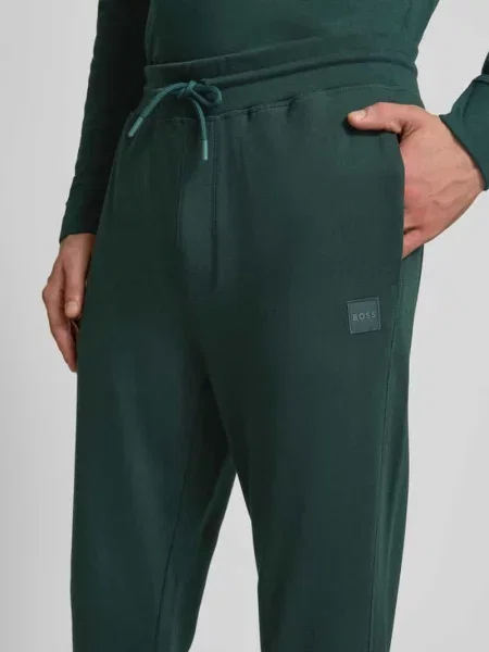 Spodnie dresowe o kroju slim fit z elastycznym pasem Boss Orange