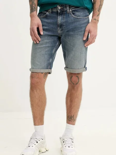 Szorty jeansowe o kroju slim fit z mieszanki bawełny model ‘RONNIE’ Tommy Jeans granatowe