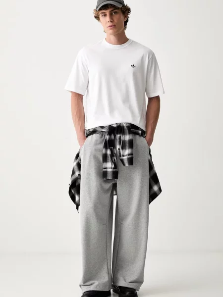 Adidas Originals teplákové nohavice pánske sivá