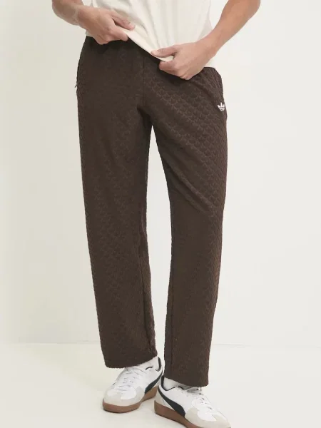 Adidas Originals spodnie dresowe MONOGRAM TR gładkie brązowy