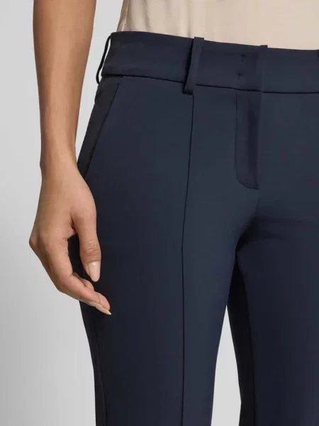 Rozkloszowane spodnie materiałowe w skróconym kroju model „FARAH” Cambio