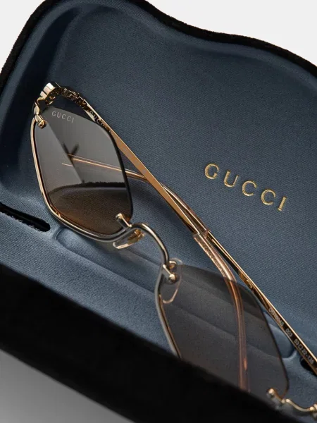 Сонцезахисні окуляри Gucci золотий