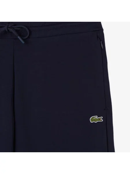 Lacoste Spodnie Dresowe Slim Fit granatowe