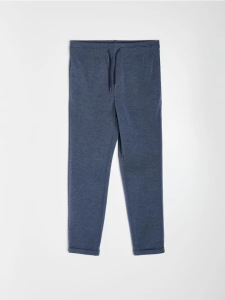 Sinsay Jogger kalhoty slim fit s příměsí viskózy námořnická modrá