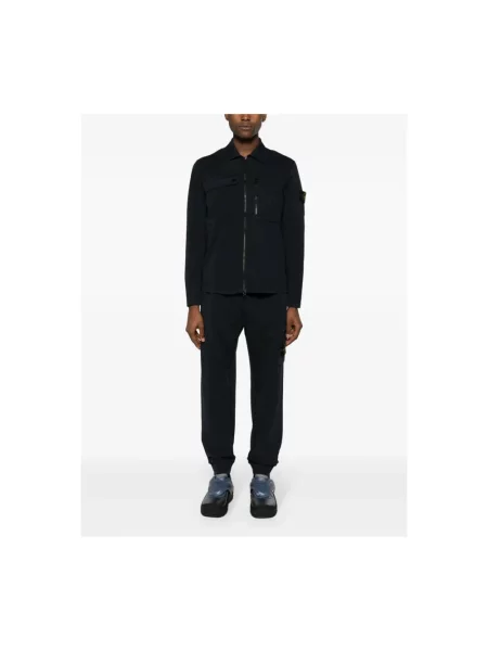 Spodnie dresowe Stone Island z kamieniami niebieskie