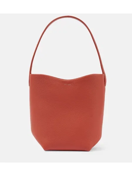 Usnjena torbica The Row rdeča