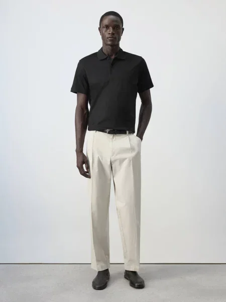 Koszulka polo regular fit Mężczyzna XS MANGO MAN czarny