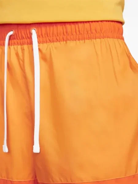 Krátké fleecové kraťasy Nike s potiskem žluté