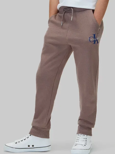 Calvin Klein Jeans pantaloni de trening pentru copii din maro