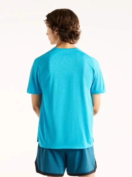 Спортивна футболка New Balance RC Essential блакитний