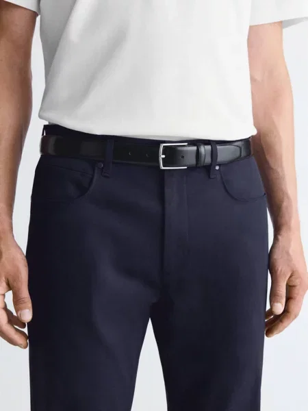 Spodnie regular fit Thermolite® Mężczyzna 38 MANGO MAN granatowy