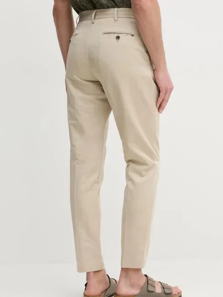 Kalhoty Tommy Hilfiger ve střihu chinos béžová