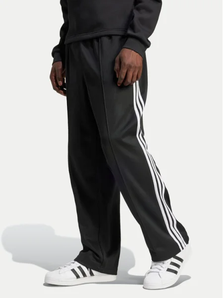 Adidas Долнище анцуг adicolor Firebird Baggy Fit черен