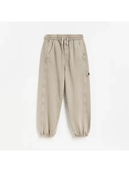 Reserved Baggy jogger nadrág koptatott hatással bézs