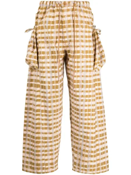 Pantaloni Story Mfg. în carouri cu imagine maro