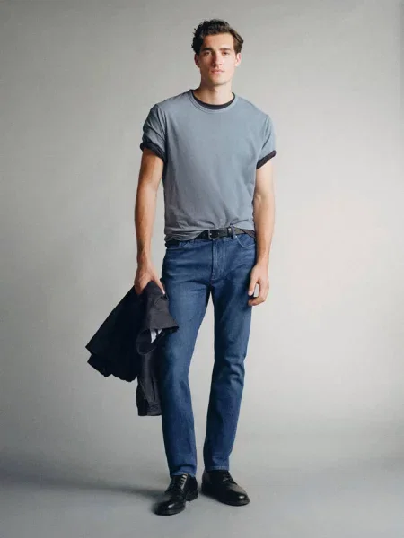 Jeansy slim fit z denimu Candiani Mężczyzna 46 MANGO MAN ciemnoniebieski