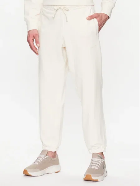 New Balance Pantaloni trening Écru