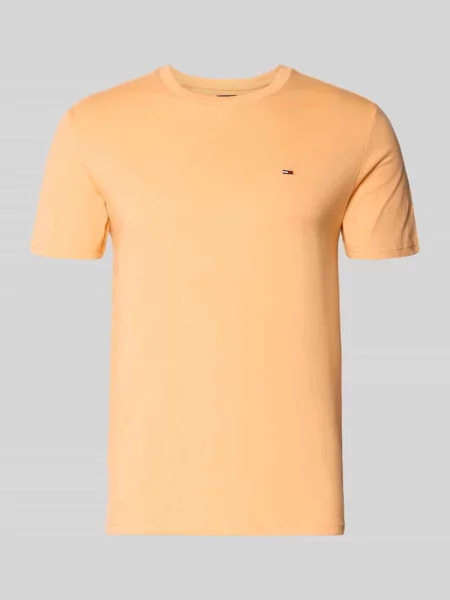T-shirt o kroju slim fit z mieszanki bawełny model ‘JASPE HERITAGE’ Tommy Jeans pomarańczowa
