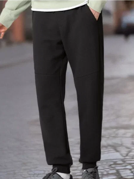 Sinsay Teplákové kalhoty se širokými nohavicemi černá