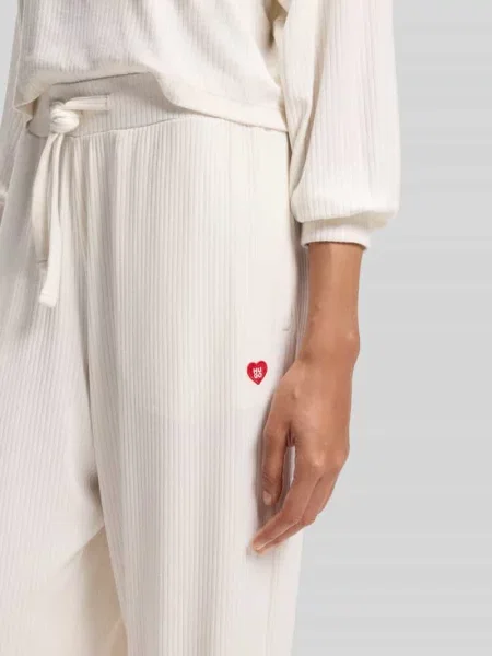 Spodnie dresowe o kroju relaxed fit z mieszanka modalu model HUGO HEART' beżowe