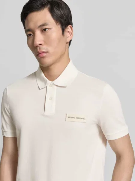 Koszulka polo o kroju regular fit z detalem z logo Armani Exchange białe