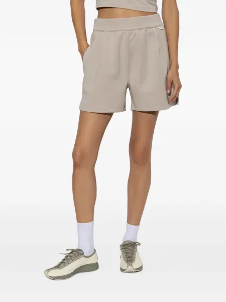 Decupat pantaloni scurți Nike cu broderie plasă roz