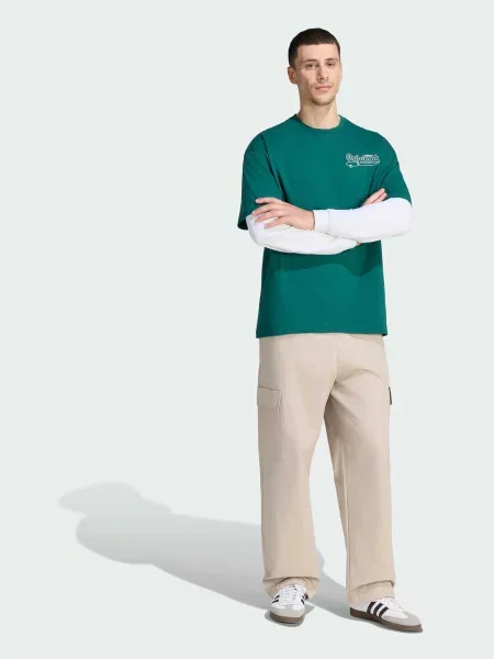 Футболка adidas Graphics зелений