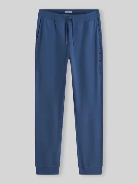 Spodnie dresowe o kroju regular fit z czystej bawełny z napisem z logo Tommy Hilfiger niebieskie