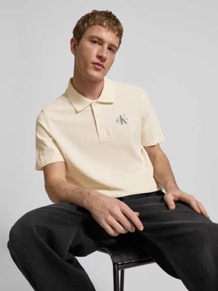Koszulka polo o kroju easy fit z kołnierzykiem polo Calvin Klein Jeans beżowe