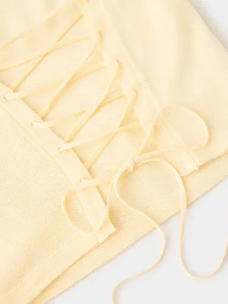 Sweter z dzianiny wiązany z tyłu pastelowy Kobieta XL MANGO żółty