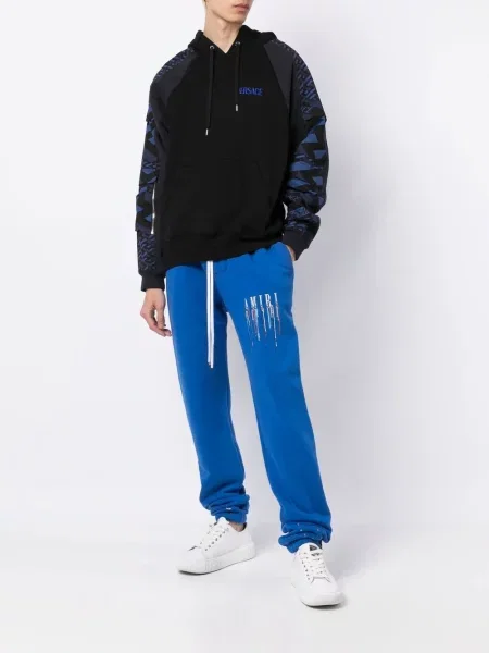 Jogger kelnės Amiri su autografu