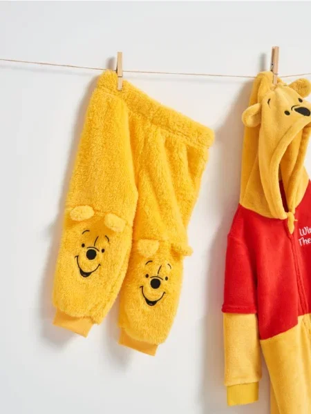 Sinsay Kalhoty Winnie the Pooh hořčicová