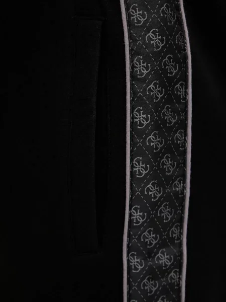 Спортивні штани Guess FINLO з аплікацією чорний