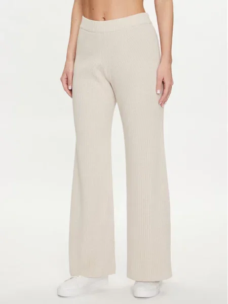 Pletene hlače Pangaia bež