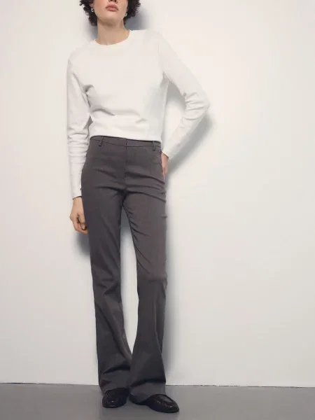 Reserved Штани flare long leg бежевий