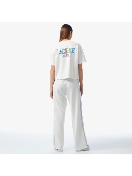Расклешенные спортивные штаны Lacoste белые
