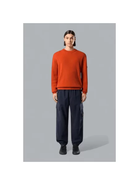 Spodnie cargo Stone Island wełniane z kamieniami niebieskie